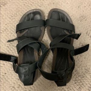 Black Teva leather wedge sandals. Size 6.